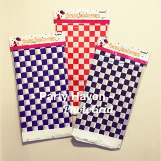 Checkered plastic table cover (avail in black, red & blue)