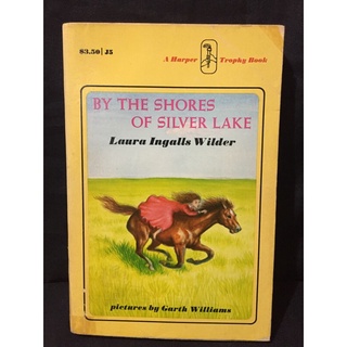 By The Shores of silver lake by:Laura Ingalls wilder
