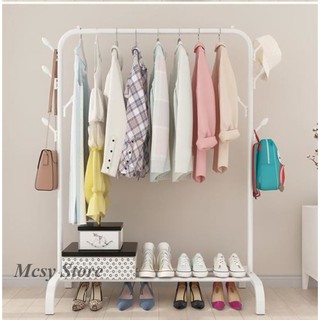 Clothing garment rack with top rod and lower storage shelf for boxes shoes boots