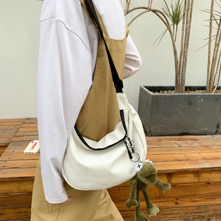 Korean version of INS student canvas solid color messenger bag female Harajuku port style dark black wind minimalist wild tide shoulder bag male (4)