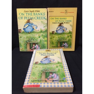 On The Banks Of Plum creek by: Laura Ingalls Wilder