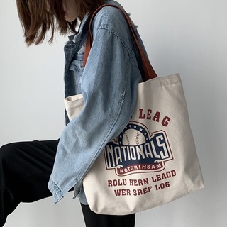 New Japanese retro simple wild one-shoulder portable canvas bag female student Korean version ins large-capacity college style tote bag