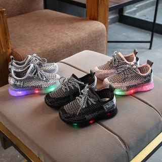 Children's ShoesNew boys and girls sports shoes children's LED light luminous shoes breathable flyin