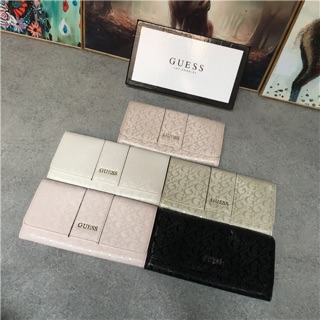 Guess wallet with box tag golossy material