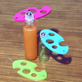 Essential oil bottle opener