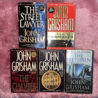 John Grisham, James Carroll and Stephen King paperback books