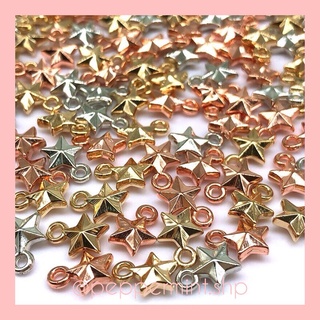 Mini star pendants / charms (approx. 100pcs)