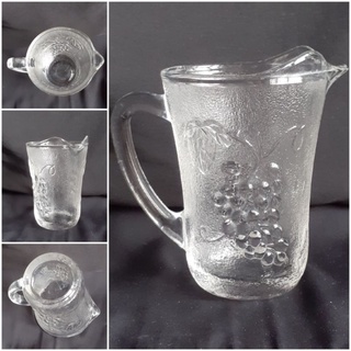 KIG INDONESIA small pitcher, clear glass, embossed grapes design, 5 in.H x 3.25in. diam., never used