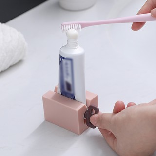 Toothpaste Squeezer Toothpaste Seat Holder Stand Multifunction Manual Rotate Rolling Tube Toothpaste Dispenser for Bathroom