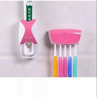 Toothpaste dispenser and toothbrush hanger