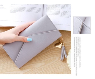 Korean women's Long Wallet long hand tassel heart-shaped pendant simple fashion multi-function wallet card bag