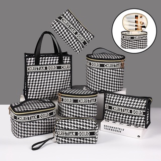 Houndstooth large-capacity cosmetic bag, portable travel hand-carry printed cosmetic case.