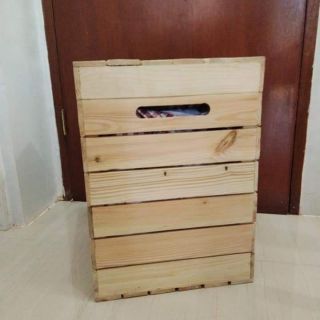 laundry bin in natural wood finish