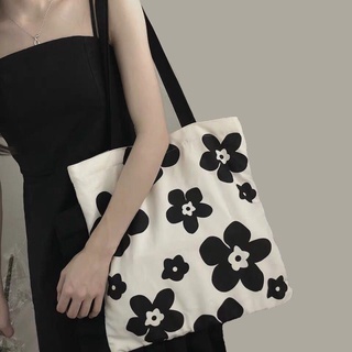 Korean ins style Canvas Black and white elegant flower female student fashion versatile single shoulder bag large capacity shopping bag