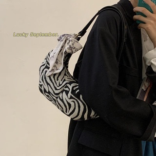 ♋✄Zebra pattern canvas bag women 2021 New Tide fashion underarm bag French niche handbag saddle bag (4)